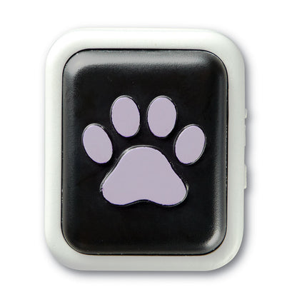 A black plastic pet doorbell with a paw print on it