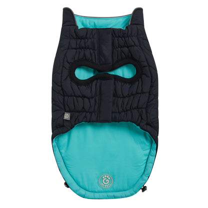 the underside of a black and aqua reversible jacket for dogs