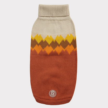 a beige and rust dog sweater with colorful mountain peaks graphic