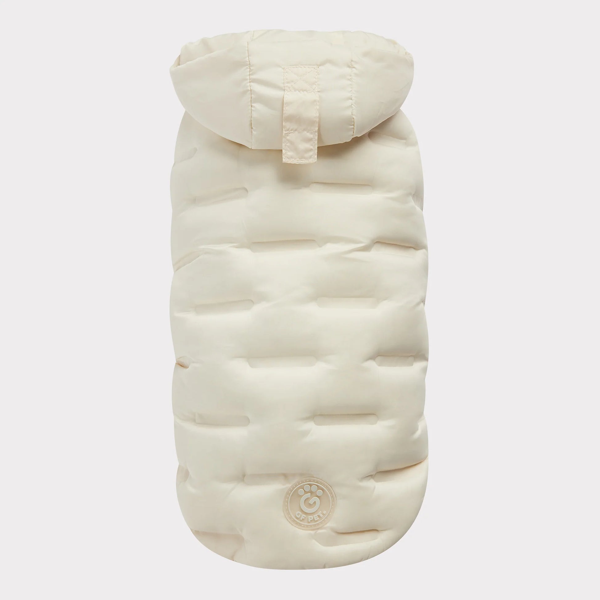 top view of a cream-colored puffer jacket for dogs 