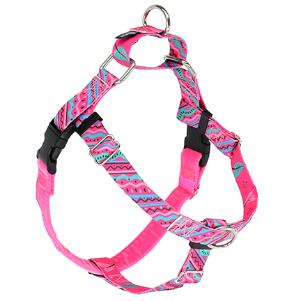 A pink  dog harness with 80s geometric colorful print