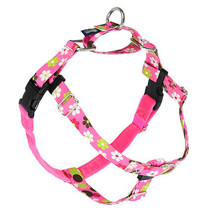 a pink dog harness with daisies print 