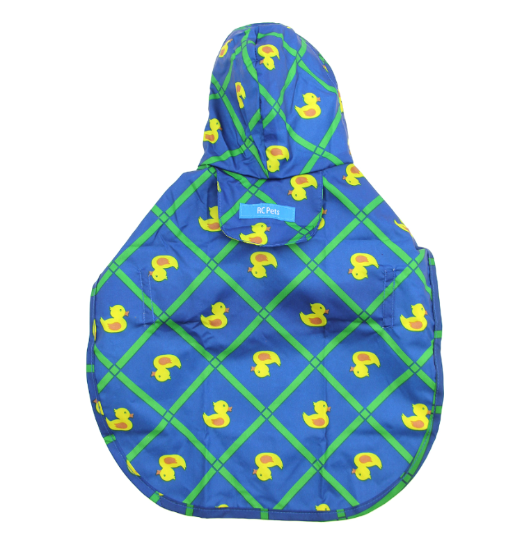 a blue hooded rain poncho for dogs with yellow ducks on it