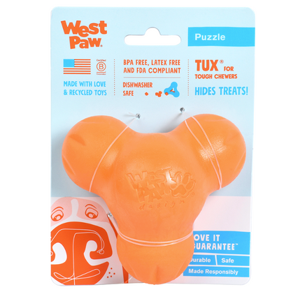 an orange 3-pointed treat dispensing dog toy in its packaging