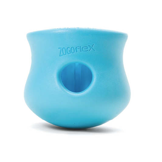 a blue treat dispensing dog toy
