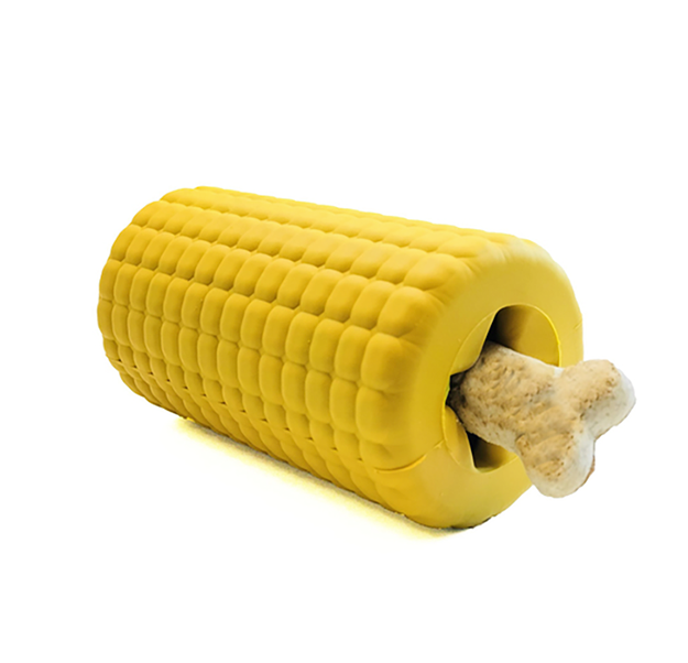Yellow corn-shaped dog toy  with bone-shaped dog biscuit sticking out of the end 