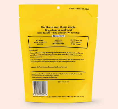 The back of a yellow bag of dog biscuits