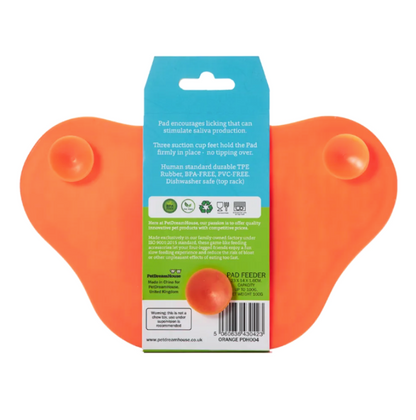 the back of an orange feeding lick mat for dogs showing suction cups