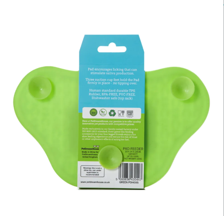 the back of a green feeding lick mat for dogs showing suction cups