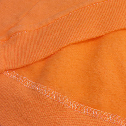 closeup of an orange hoodie for dogs