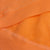 closeup of an orange hoodie for dogs