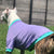 rear view of a white and brown pit bull type dog wearing a purple and aqua t-shirt standing outside