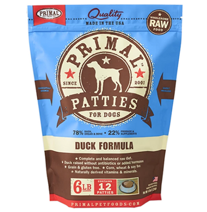 A blue and brown bag of frozen duck dog food patties