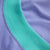 closeup of the collar of a purple and aqua t-shirt for dogs